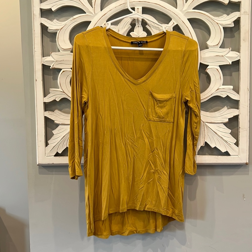 Mustard 3/4 sleeve top with pocket detail